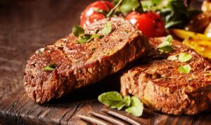 beef steaks on a cutting board