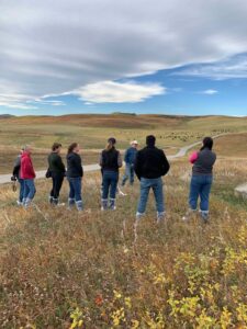 farm tour biosecurity using boot covers during the 2024-25 BCRC beef researcher mentorship