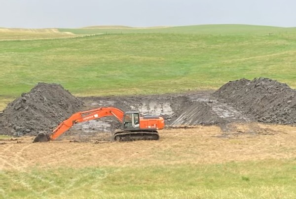 Digging a new stock water dugout 